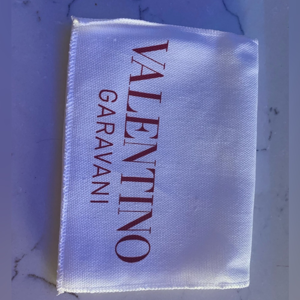 Brand new rare smaller authentic Dust envelope Valentino folder. Must have!